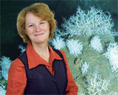 Tunnicliffe, against a backdrop of sea lilies, corals and basket stars at the Ruby Seamount on the Mariana Volcanic Arc.