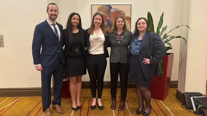 Law students pose at a moot competition.