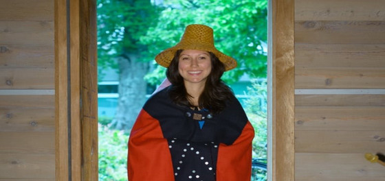 LLM student Christina Gray wearing her Ts'msyen regalia when graduating with her Juris Doctor degree.