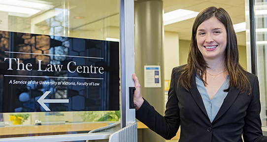 Woman standing in the doorway of The Law Centre