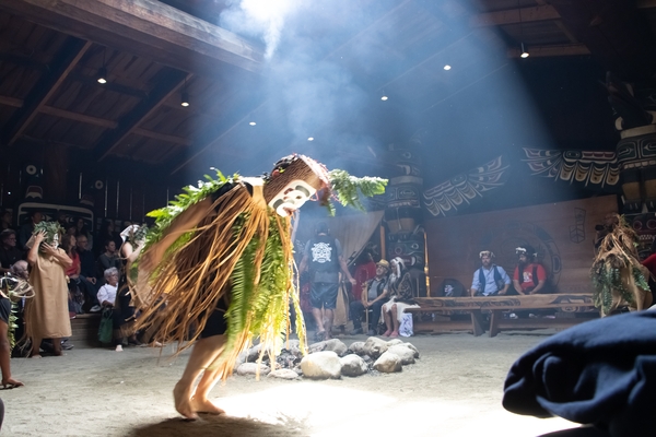 The Stump spirit dances around a fire