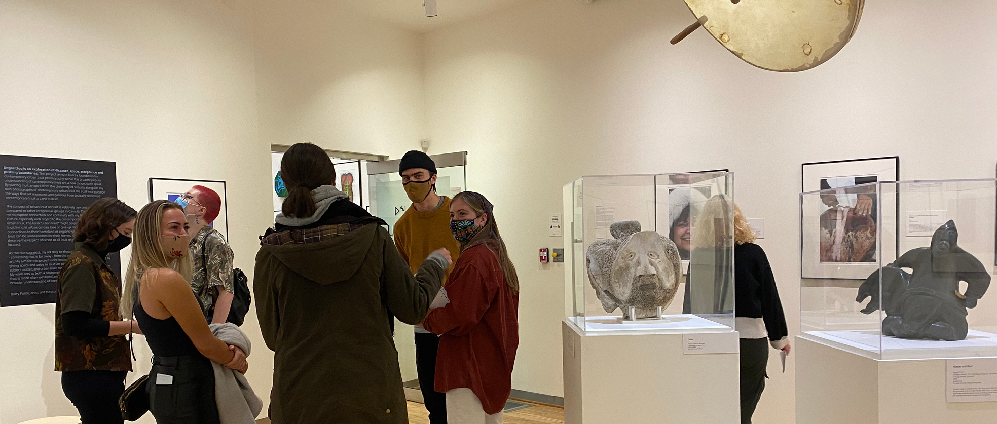 Students discuss an exhibition at Legacy Downtown.