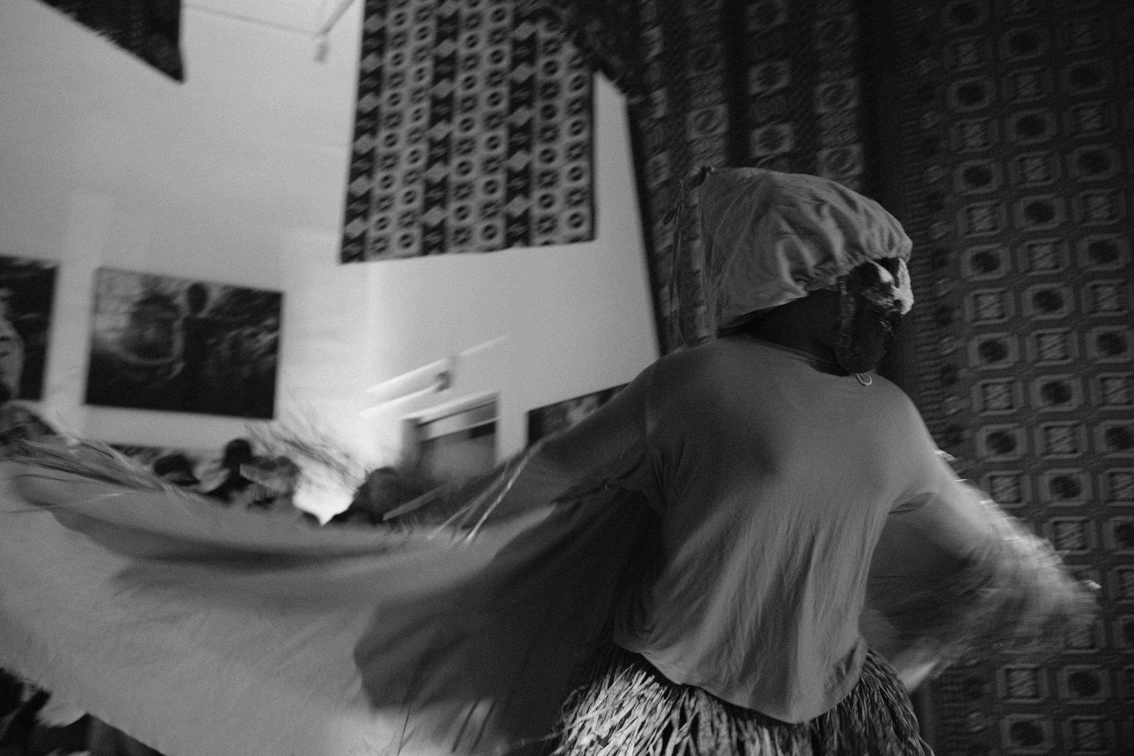 Masked dancer in motion
