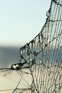 A piece of shattered glass against a hazy horizon.