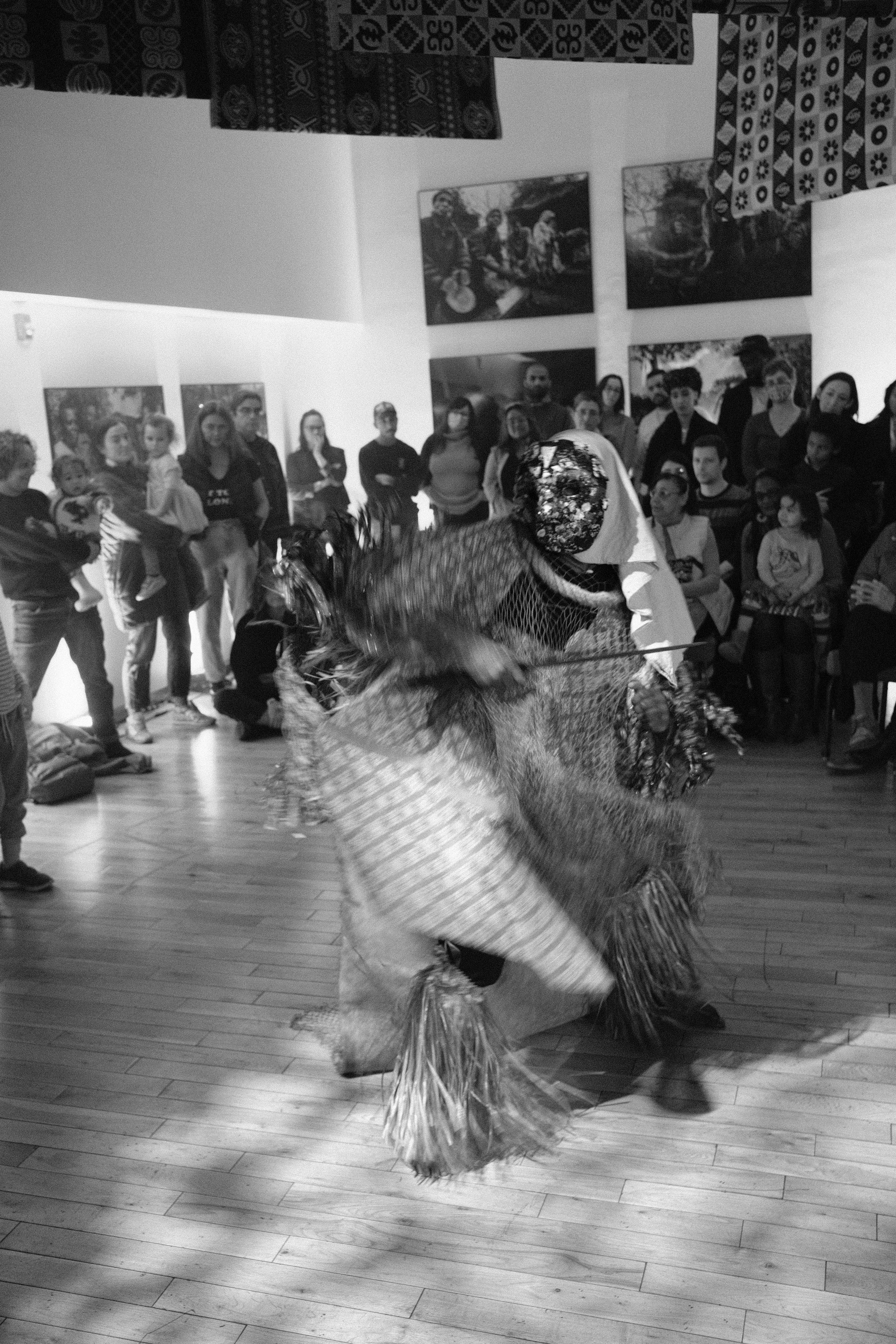 Masked dancer with blade