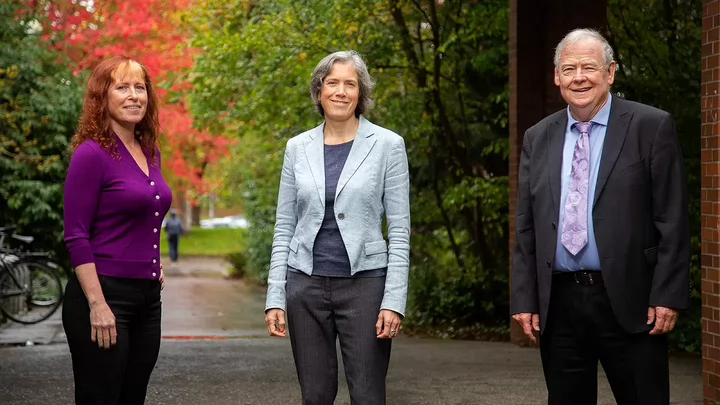 Holly, Deborah and Calvin standing outside the Fraser Building.