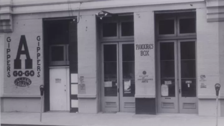 Black and white photo of Pandora's Box storefront