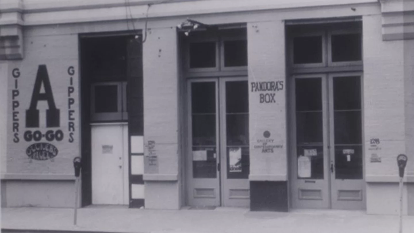 Black and white photo of Pandora's Box storefront