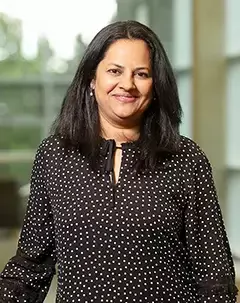 Headshot of librarian Aditi Gupta.