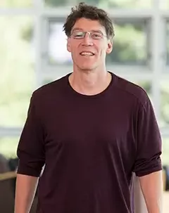 Headshot of librarian daniel Brendle-Moczuk.