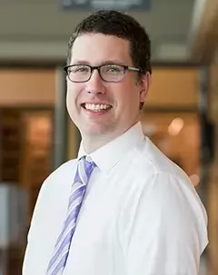 Headshot of librarian David Boudinot.