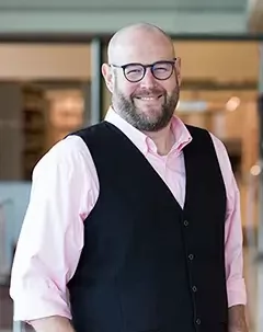 Headshot of Kula director Matt Huculak.