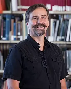 Headshot of Michael Lines.