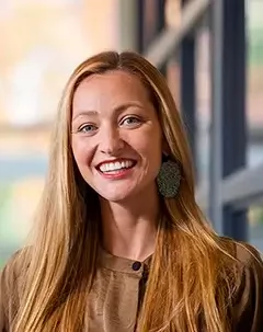 Headshot of librarian Monique Grenier.