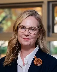 Headshot of librarian Pia Russell.