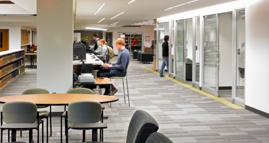 Students enjoy the informal seating with its comfy chairs and couches.