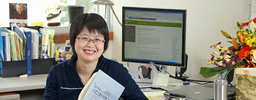 Smiling librarian at a desk