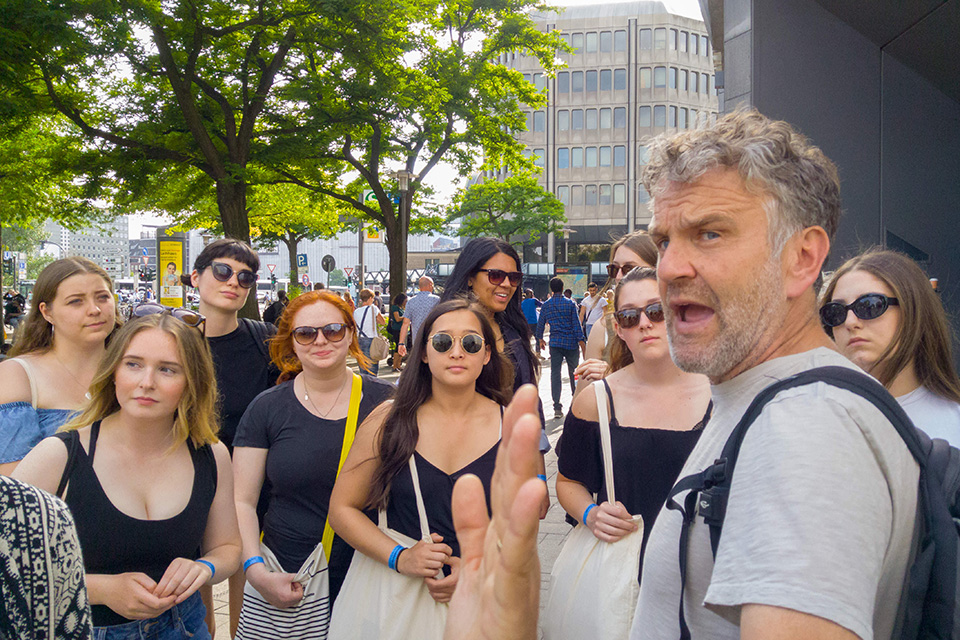 Cam Owens speaking to students on a field trip in 2018.