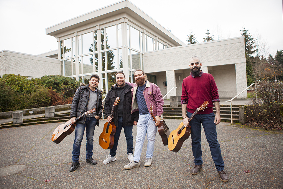 (l-r) Orwa Alsharaa, Gaby Albotros, Nazir Salameh and Mohammed Mir Mahmoud in front of UVic’s Fine Arts Building, November 2018. Credit: UVic Photo Services.
