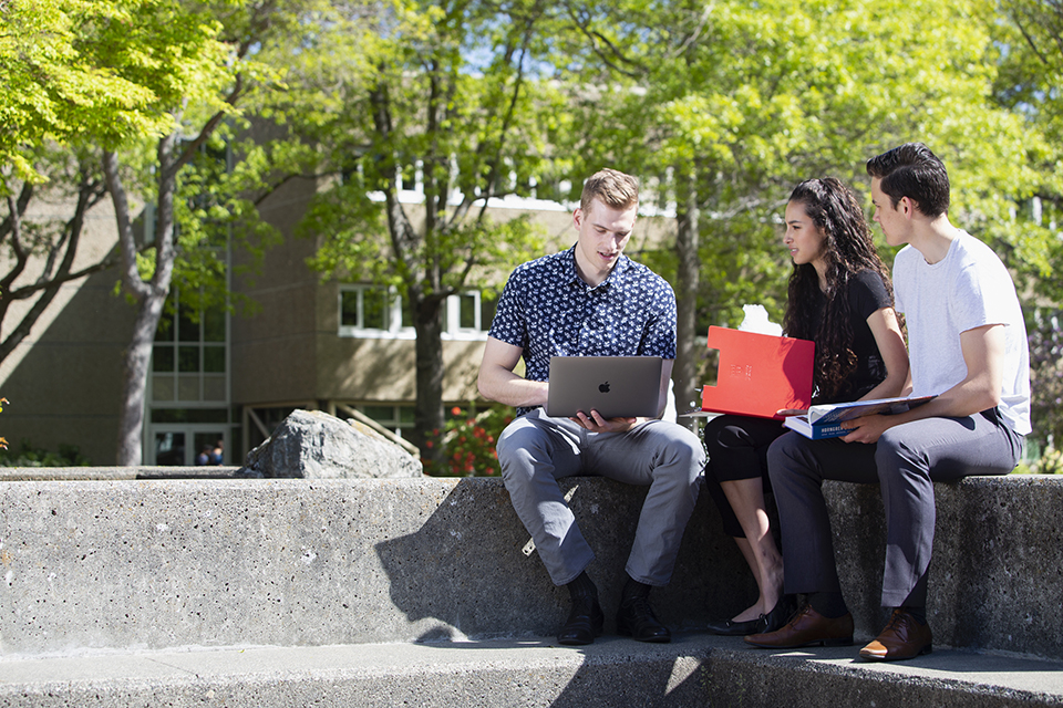 UVic BCom students Hayden Frisch, Julia Greer and Liam Moore on campus