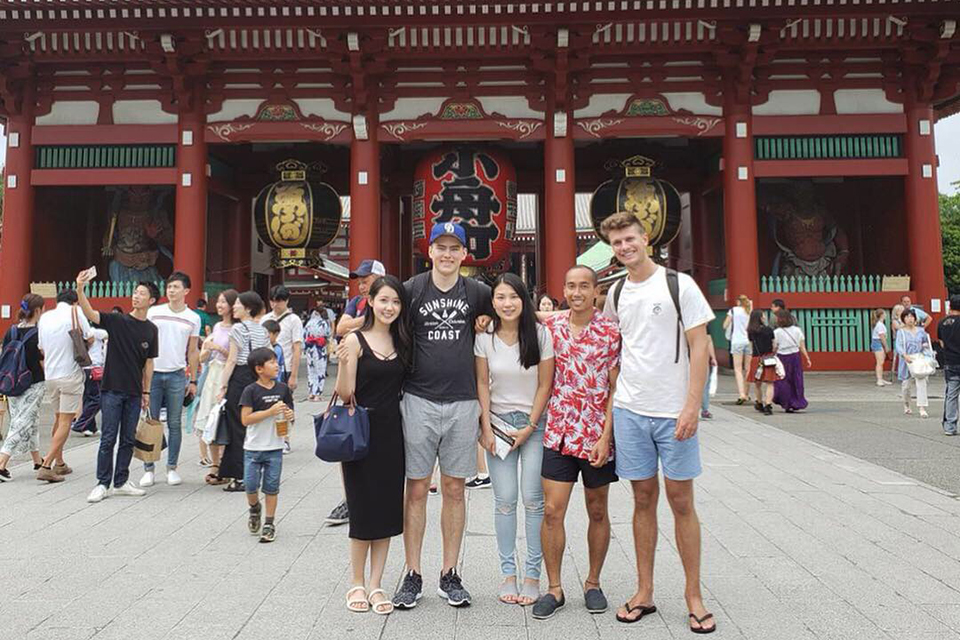 UVic business student with friends in Japan