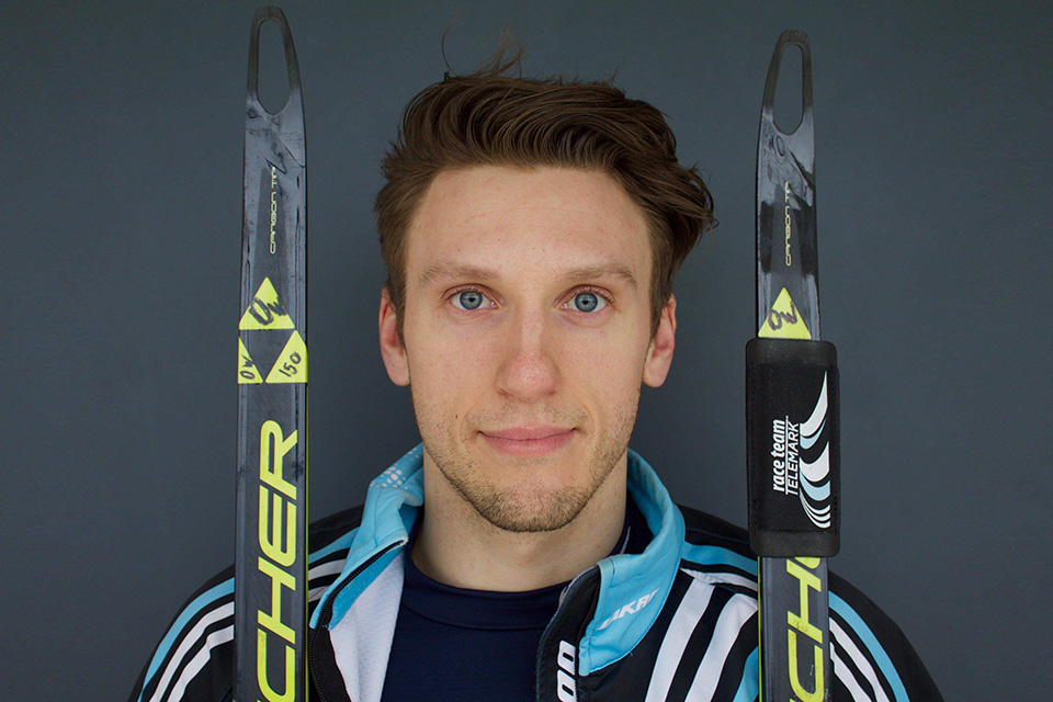 Profile photo of David Walker holding skis