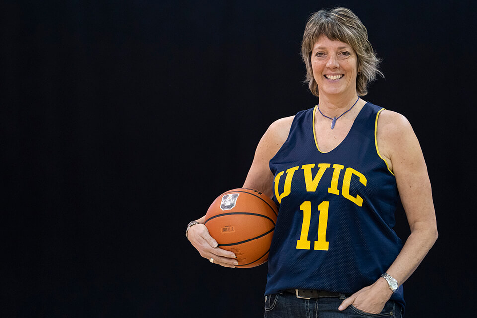 UVic Vike Lori Clarke holding a basketball