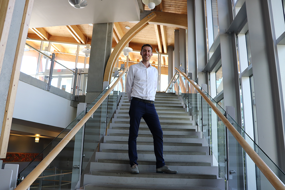 Chris Bruce on a staircase in the David Turpin Building