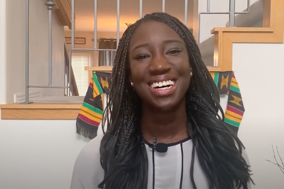 Debbie Yeboah smiling as part of her virtual keynote address.