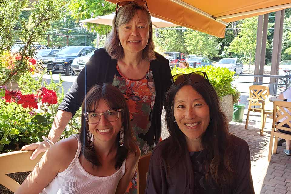 UVic PhD graduate Andrea Mellor with supervisors, Denise Cloutier (back), Karen Kobayashi (right)