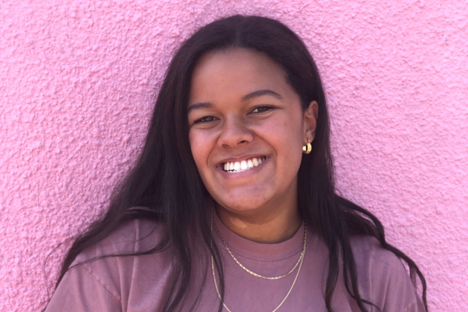 Student pictured wearing pink.