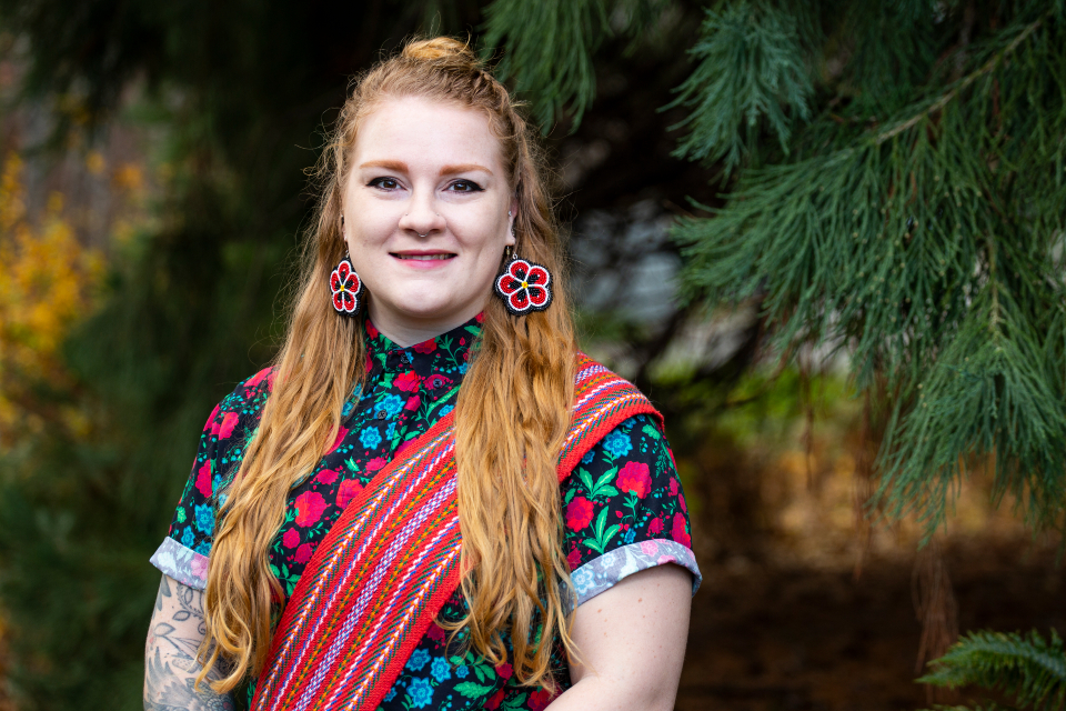 Student pictured in landscape.