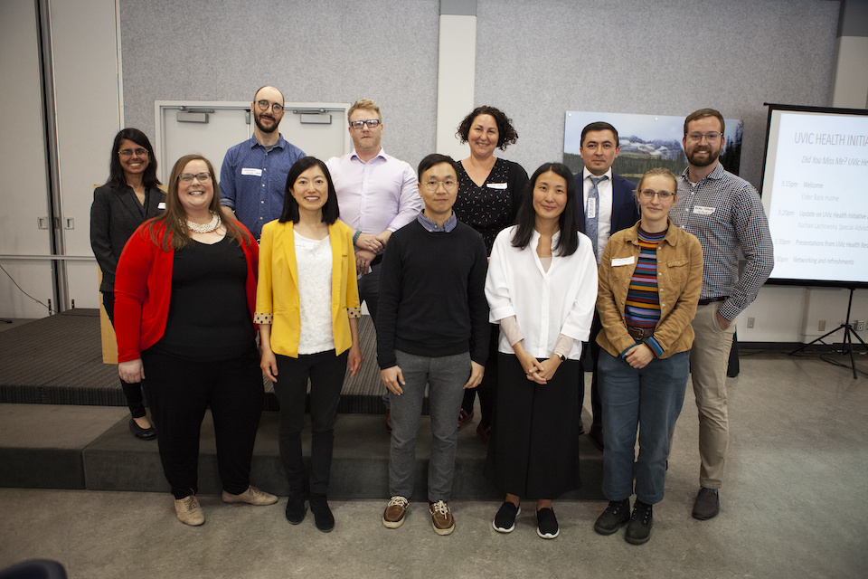 Group of researchers smiling.