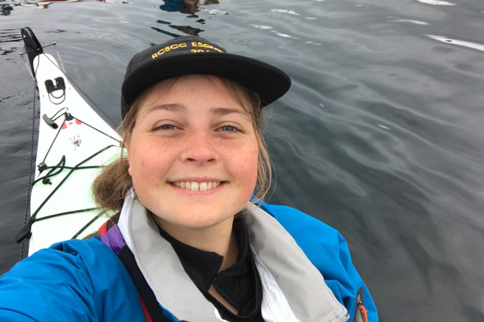 Smiling selfie of Renata Kamel on her kayak