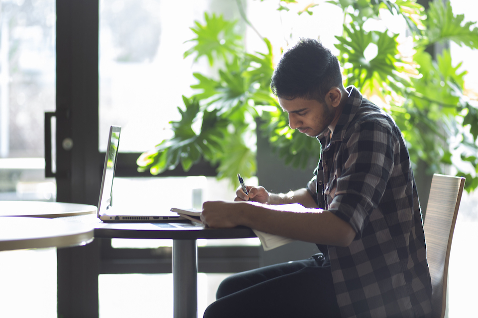 student studying in mystic market