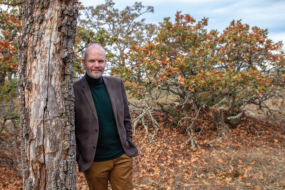 Sean Holman oversees the Climate Disaster Project in which journalism students compile firsthand accounts of people who have survived climate disasters. Photo by John Threlfall