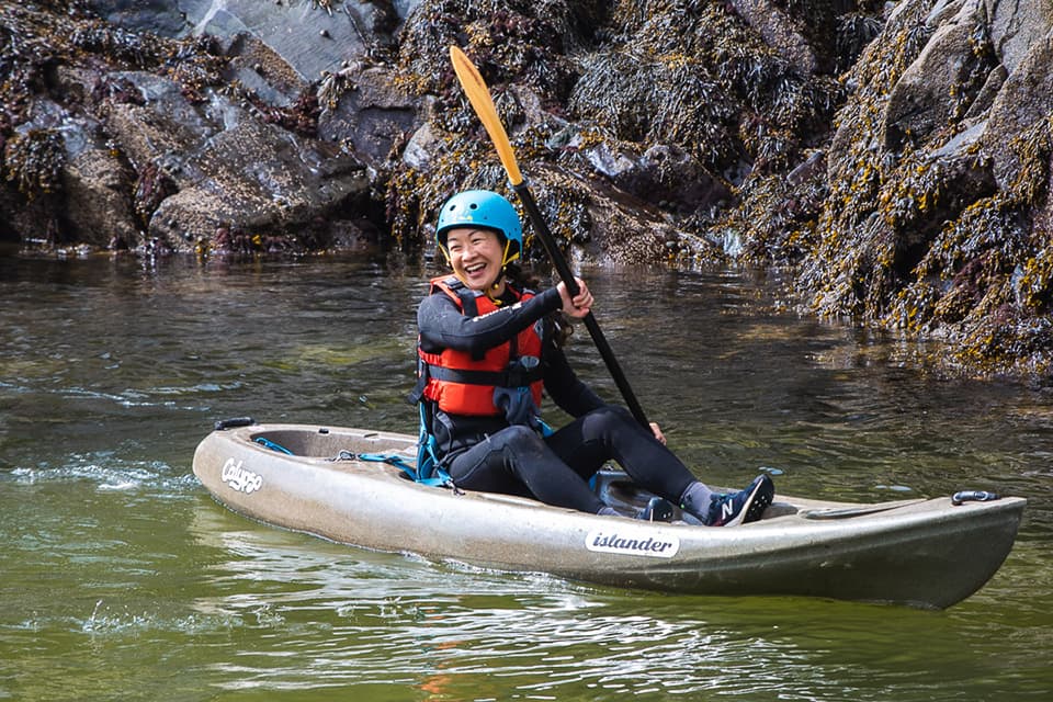 Schaub paddling a kayak