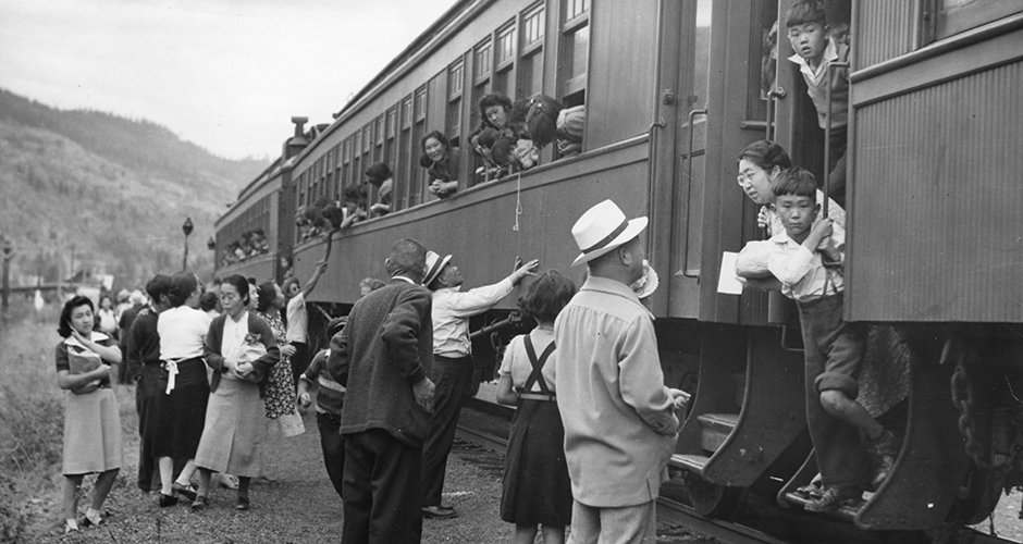 Old photo of Japanese Canadians boarding train