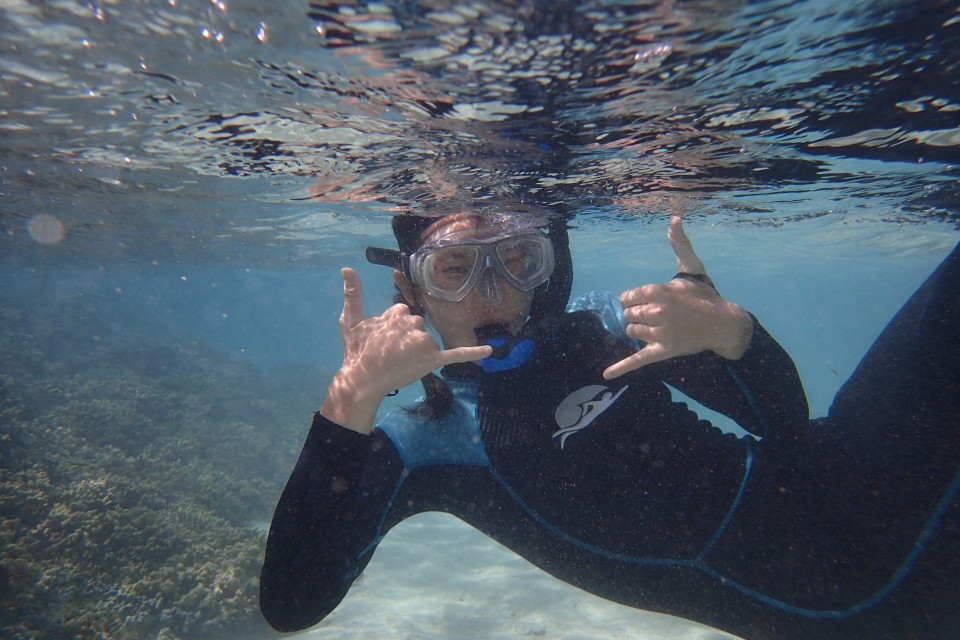 Lauren snorkeling under water