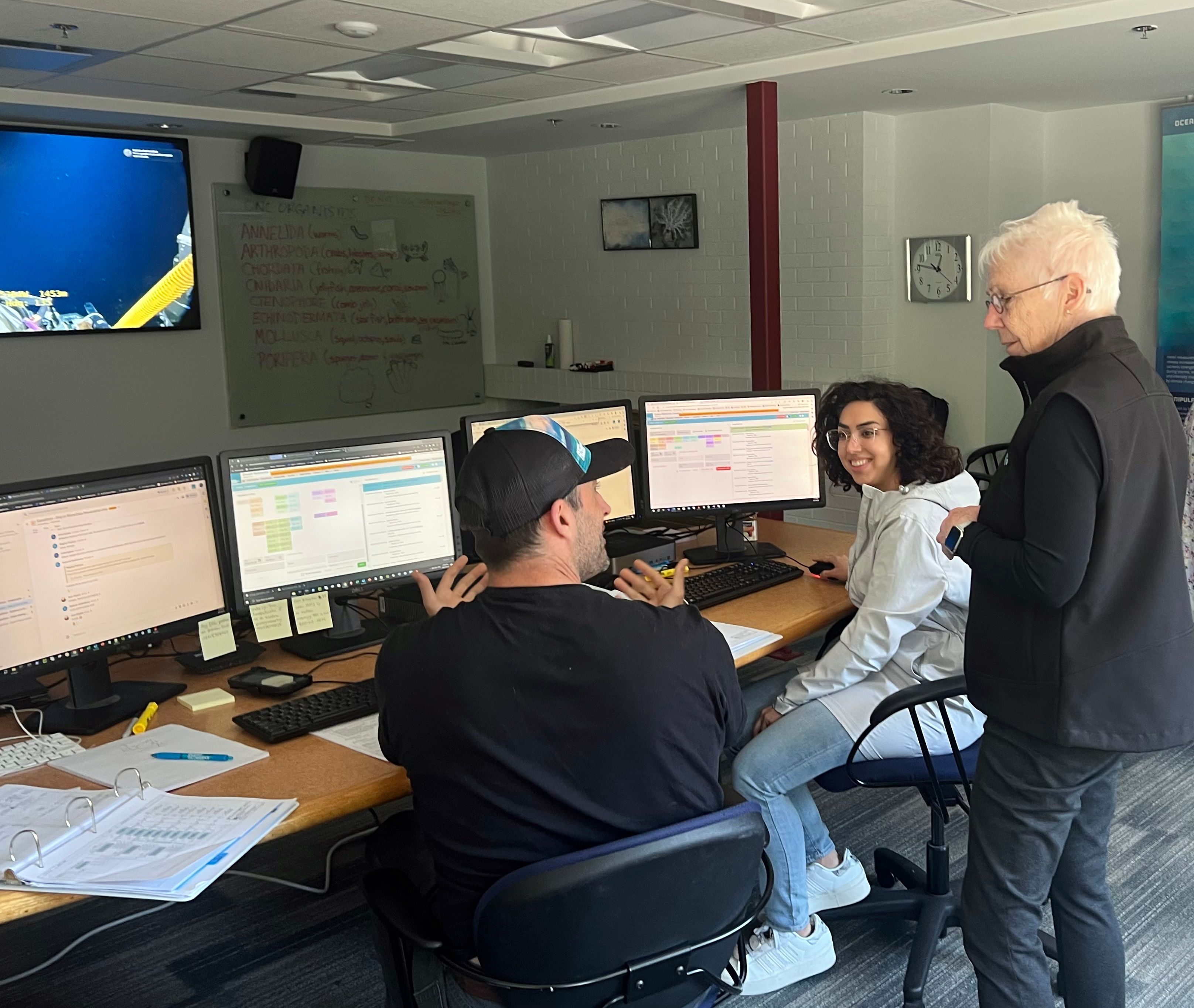 ONC’s Queenswood HQ during the current #ONCAbyss summer expedition (June 25-July 18, 2023). (L-R) GIS Specialist Jeff Samson, Data Steward Bahar Torabidavan,  and ONC President and CEO Kate Moran. Credit: Ocean Networks Canada