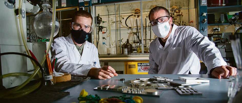 UVic chem grad student, Ben Godwin, and supervisor Jeremy Wulff are pictured in a lab.