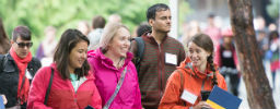 Students walking across campus during Graduate Orientation