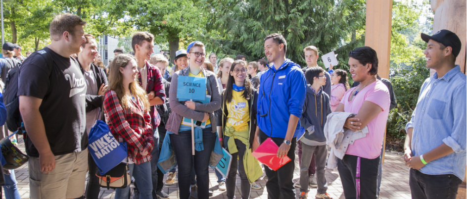 Group of students during orientation standing outside the First Peoples House