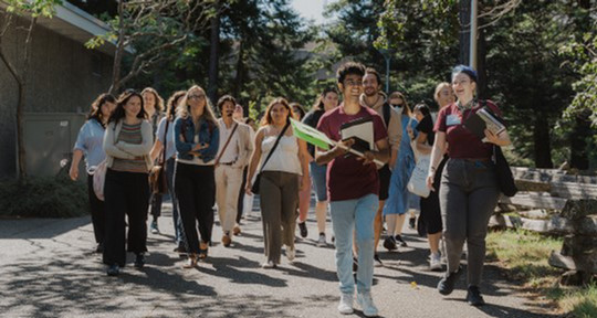 Students on a campus tour, outside on the Quad