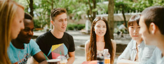 Group of students hanging out outside