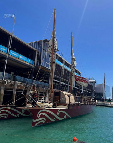 Double-hulled voyaging canoe