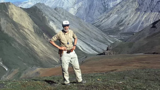 Hoffman stands on mountains