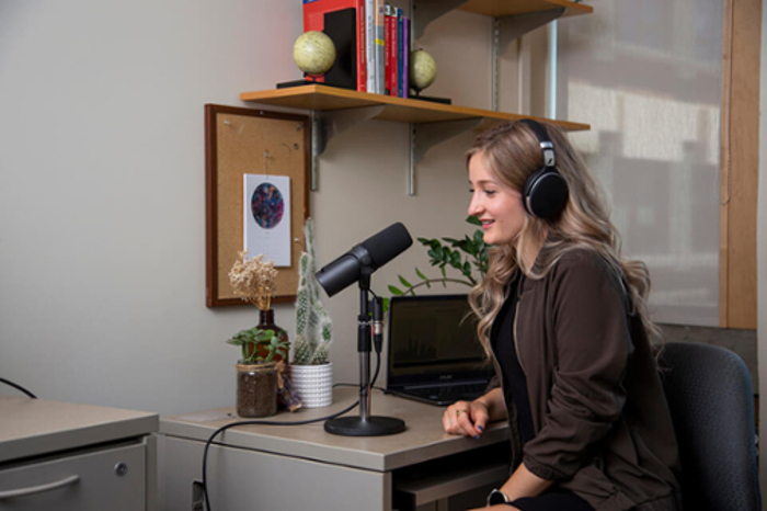 Cynthia McDowell works on the Call to Mind podcast