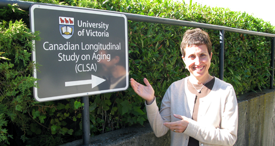 Woman gesturing to a CLSA sign