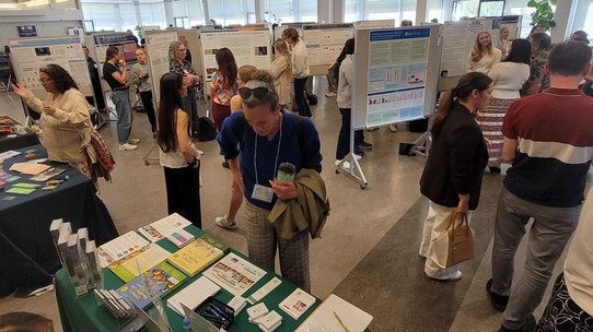 Students displaying research posters